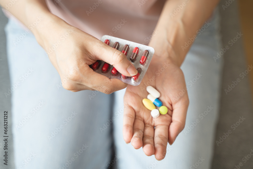 Healthcare Harmony: Close-Up Hands Holding Medication and Water Glass for Optimal Wellness, Pharmaceutical Treatment and mental health treatment Healthcare Harmony: Close-Up Hands Holding Medication and Water Glass for Optimal Wellness, Pharmaceutical Treatment and mental health treatment