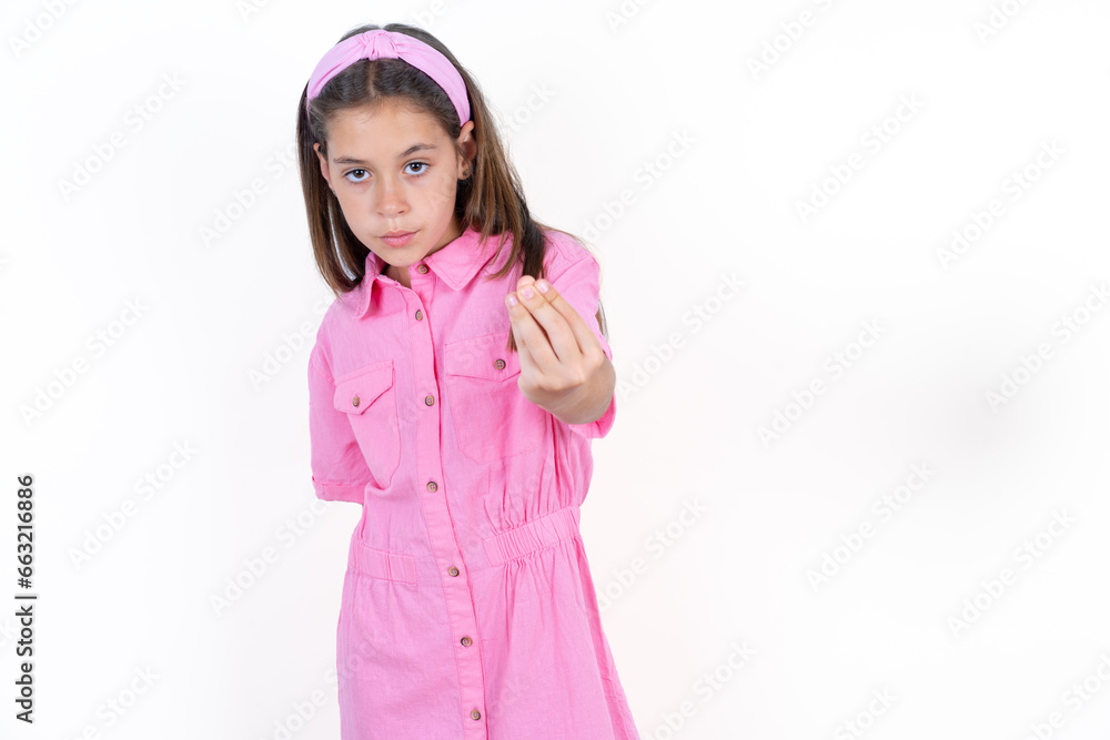 Beautiful little kid girl wearing pink dress angry gesturing typical italian gesture with hand, looking to camera Beautiful little kid girl wearing pink dress angry gesturing typical italian gesture with hand, looking to camera