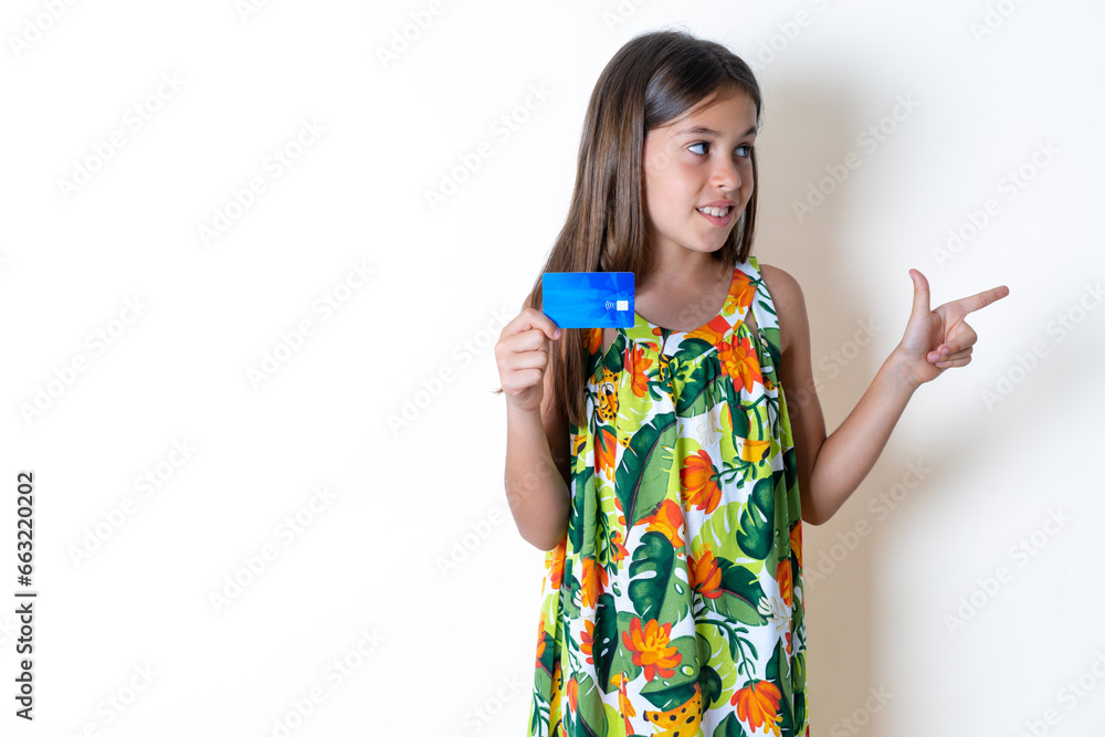 Curious smiling MODEL showing plastic bank showing finger copyspace Curious smiling MODEL showing plastic bank showing finger copyspace