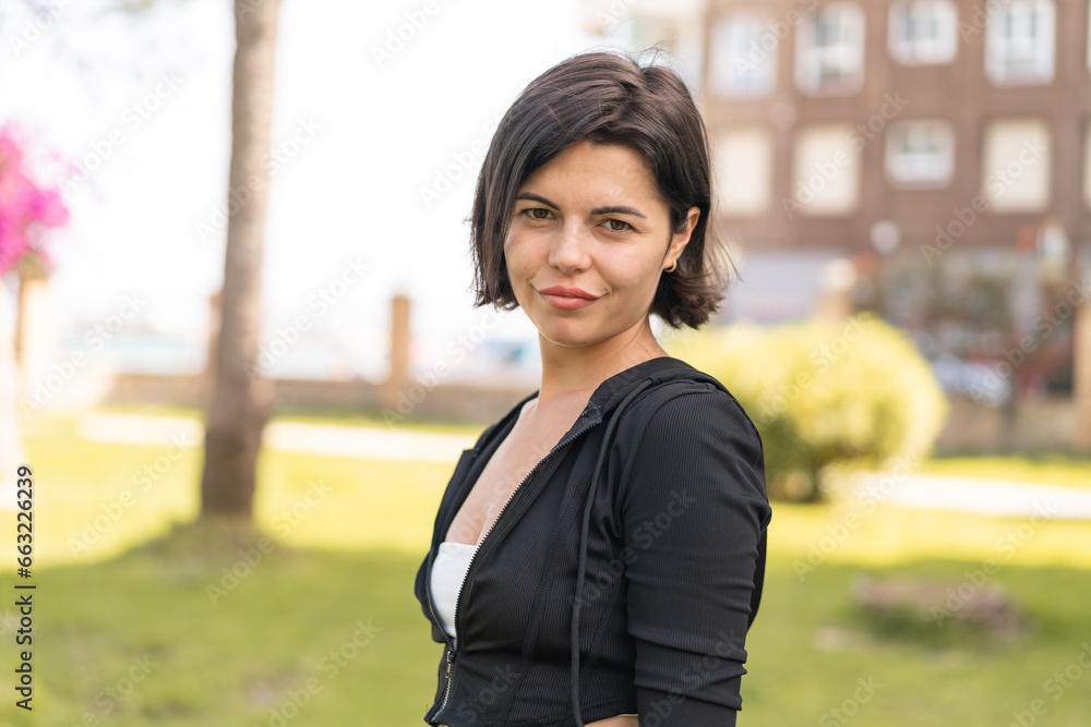 Young pretty Bulgarian woman at outdoors . Portrait