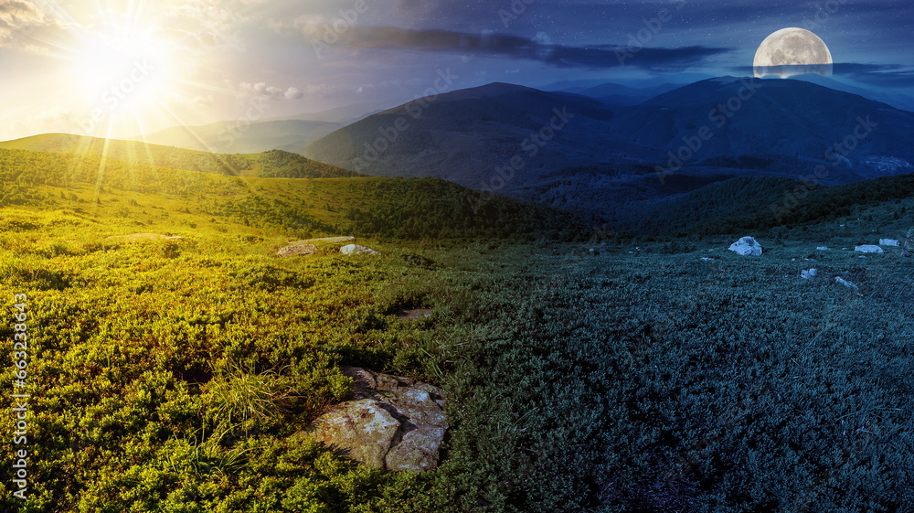 mountain panorama landscape with sun and moon at twilight. stones in grass on top of the hillside of mountain range. day and night time change concept. mysterious countryside scenery in morning light