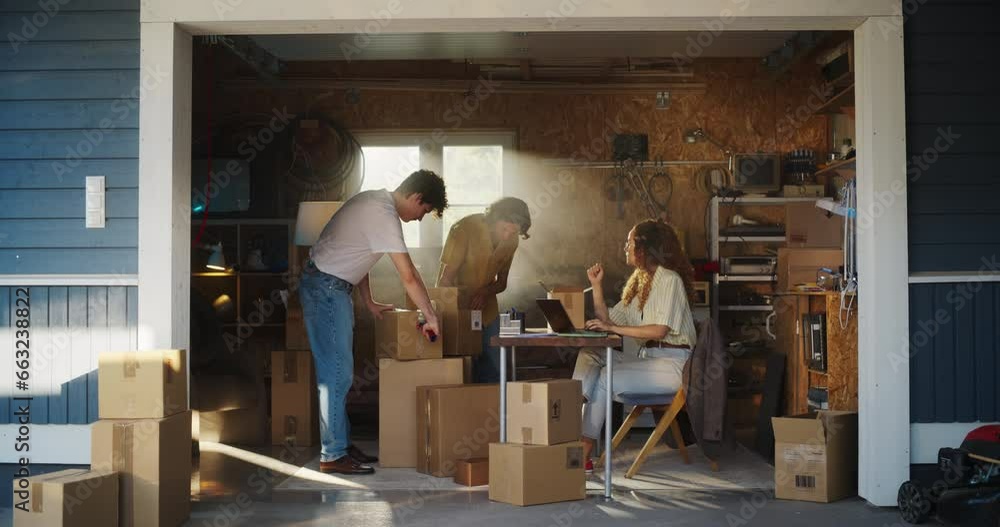 Diverse Family Business Owners Working in Home Garage And Talking. Hispanic Female Assistant Filling Online Orders On Laptop. Two Caucasian Brothers Packing Products In Boxes For Delivery To Clients. Diverse Family Business Owners Working in Home Garage And Talking. Hispanic Female Assistant Filling Online Orders On Laptop. Two Caucasian Brothers Packing Products In Boxes For Delivery To Clients.