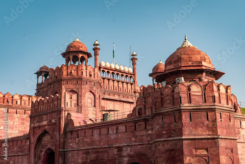 beautiful view of a red fort with Indian flag on the top