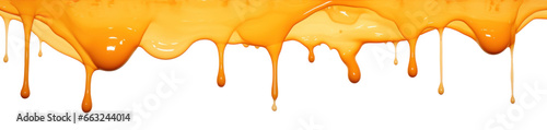 Orange paint drips and flows down from the top of the picture, isolated