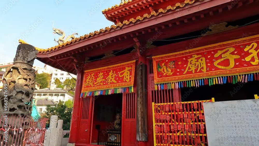 view over Cofucius Shrine in Nagasaki, Japan. Blue sky colorful temple with vibrant colors. Travelling Japan view over Cofucius Shrine in Nagasaki, Japan. Blue sky colorful temple with vibrant colors. Travelling Japan