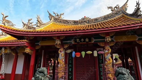 entry hall of Cofucius Shrine in Nagasaki, Japan. Blue sky colorful temple with vibrant colors. Travelling Japan photo