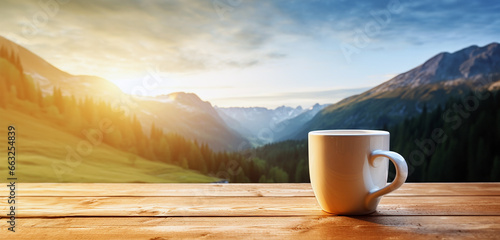A cup of hot morning coffee on a wooden table against a beautiful background of sunrise scene in the mountains. Wide scale panoramic image created by Generative AI © bagotaj