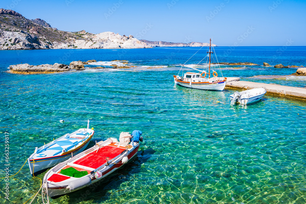 Fototapeta premium Fishing boats in small harbor of Mandrakia village, Milos island, Cyclades, Greece