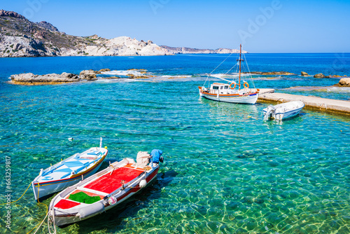 Fishing boats in small harbor of Mandrakia village, Milos island, Cyclades, Greece