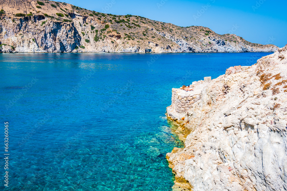 View of sea bay with crystal clear water in Firopotamos, Milos island, Cyclades, Greece View of sea bay with crystal clear water in Firopotamos, Milos island, Cyclades, Greece