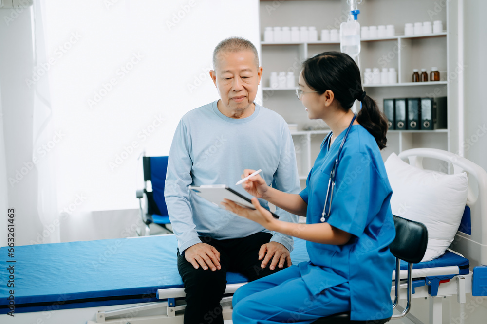 Obraz premium Female doctor holding male patient hand on the bed with receiving saline solution in hospital or clinic..
