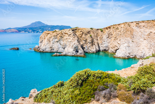 View of beautiful rocky coast near Tsigrado beach and azure sea water, Milos island, Cyclades, Greece