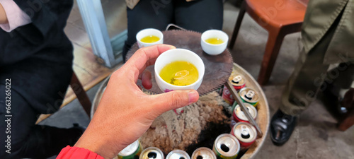 Canvas Print asia tea party near bonfire