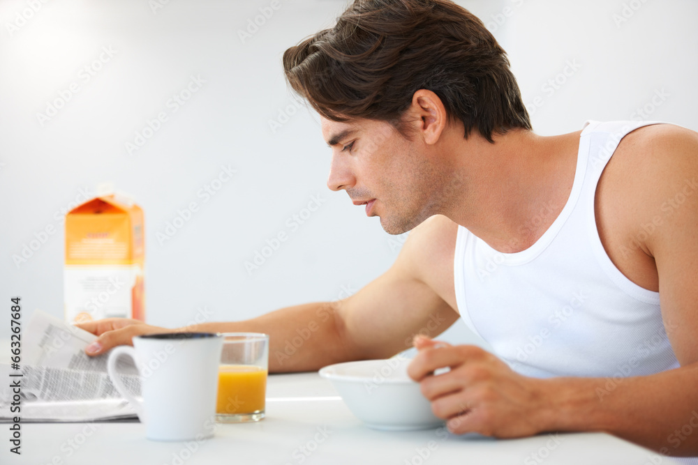 Home, relax and man with breakfast, newspaper and information with food, smile and juice. Happy person, apartment and guy with health, morning meal and kitchen with newsletter, wellness and reading Home, relax and man with breakfast, newspaper and information with food, smile and juice. Happy person, apartment and guy with health, morning meal and kitchen with newsletter, wellness and reading