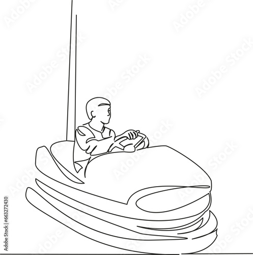 boy rides on an amusement ride