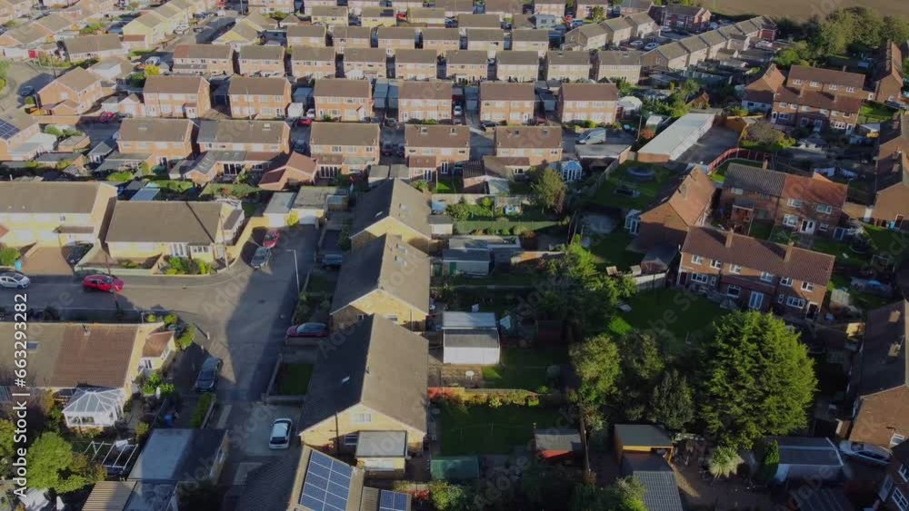 Drone 50fps. Middle class suburban council housing estate. Rooftops, gardens. Filmed Manchester. UK. Drone 50fps. Middle class suburban council housing estate. Rooftops, gardens. Filmed Manchester. UK.