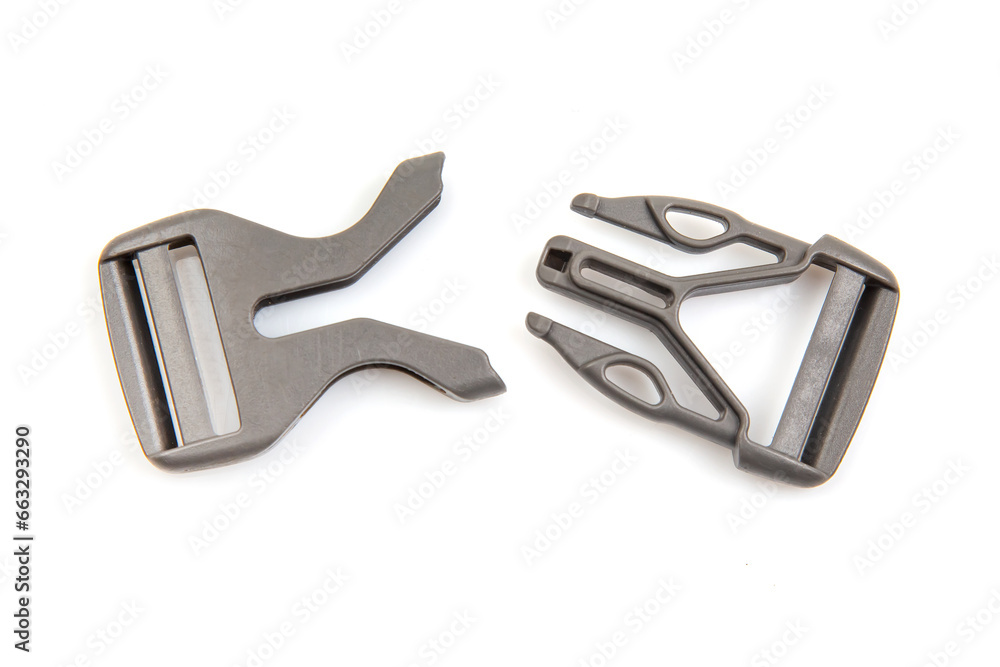 Fastex plastic clip for backpacks, bags, nylon belts on a white background. items and accessories for clothing and fixing tourist equipment Fastex plastic clip for backpacks, bags, nylon belts on a white background. items and accessories for clothing and fixing tourist equipment
