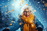 portrait of a smiling happy old woman enjoying snowy winter
