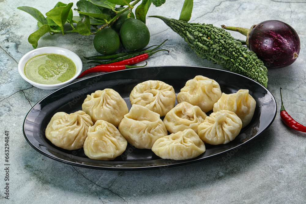 Nepali steamed dumplings Momo with sause Nepali steamed dumplings Momo with sause
