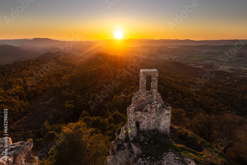 A sunset over the ruins of Sant Miquel del Castell de Queralt chapel (10th century) @ Bellprat, Catalonia, Spain. photo