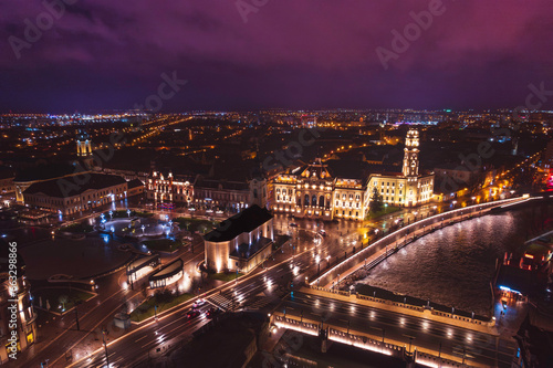 Oradea romania tourism aerial a dazzling night skyline showcasing the rich heritage and historic attractions of a European city © Damian