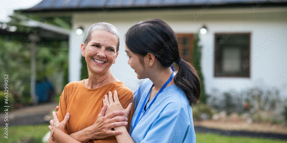 Nurse or caregiver hand on walking frame for support, help or trust moving leg in rehabilitation. Physiotherapy healthcare, Medical caregiver consulting disabled elderly patient at home Nurse or caregiver hand on walking frame for support, help or trust moving leg in rehabilitation. Physiotherapy healthcare, Medical caregiver consulting disabled elderly patient at home