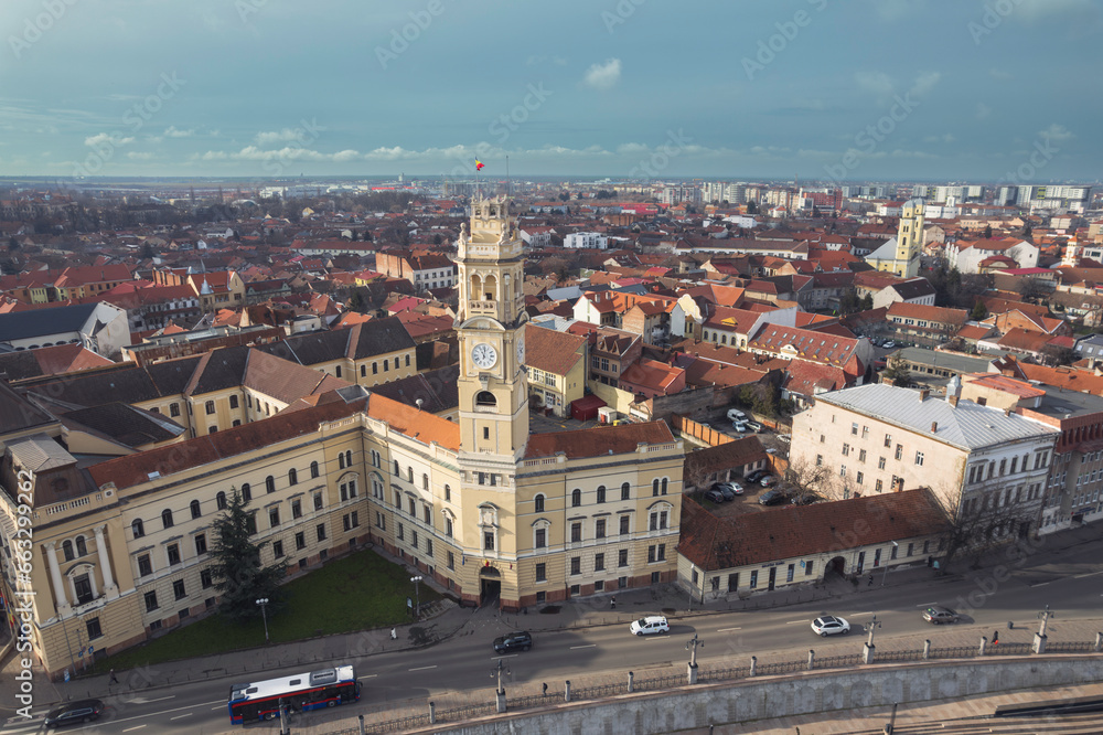 Aerial art nouveau historical an aerial view of a bustling city with a stunning clock tower in the center incity Oradea, Bihor, Romania
