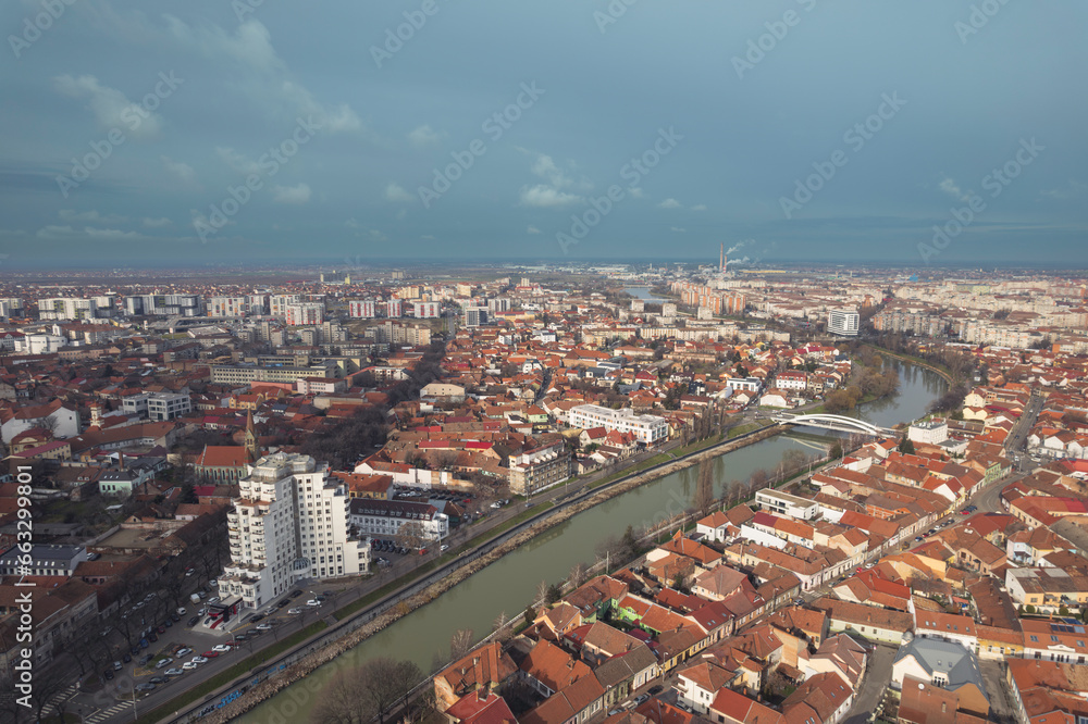 Fototapeta premium Aerial art nouveau historical Oradea Cityscape with Majestic River Flowing Through the Historic Art Nouveau Architecture incity Oradea, Bihor, Romania