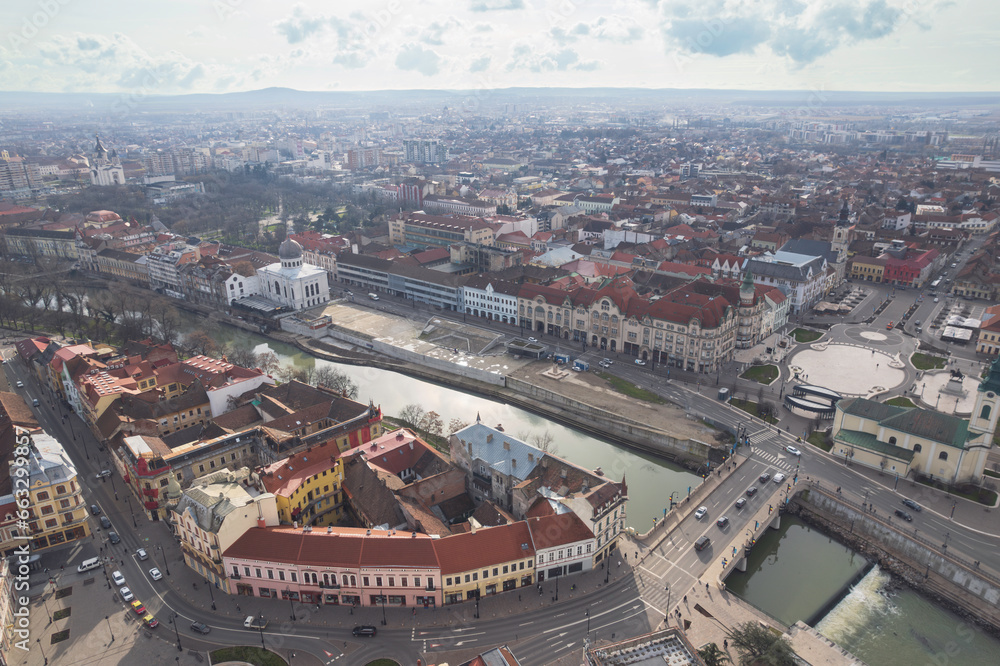 Oradea romania tourism aerial a vibrant city skyline illuminated at night, showcasing its historic and cultural attractions