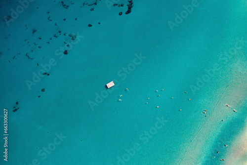 Aerial view of swimmers in the Aegean Sea in Cesme, Izmir, Turkey. photo