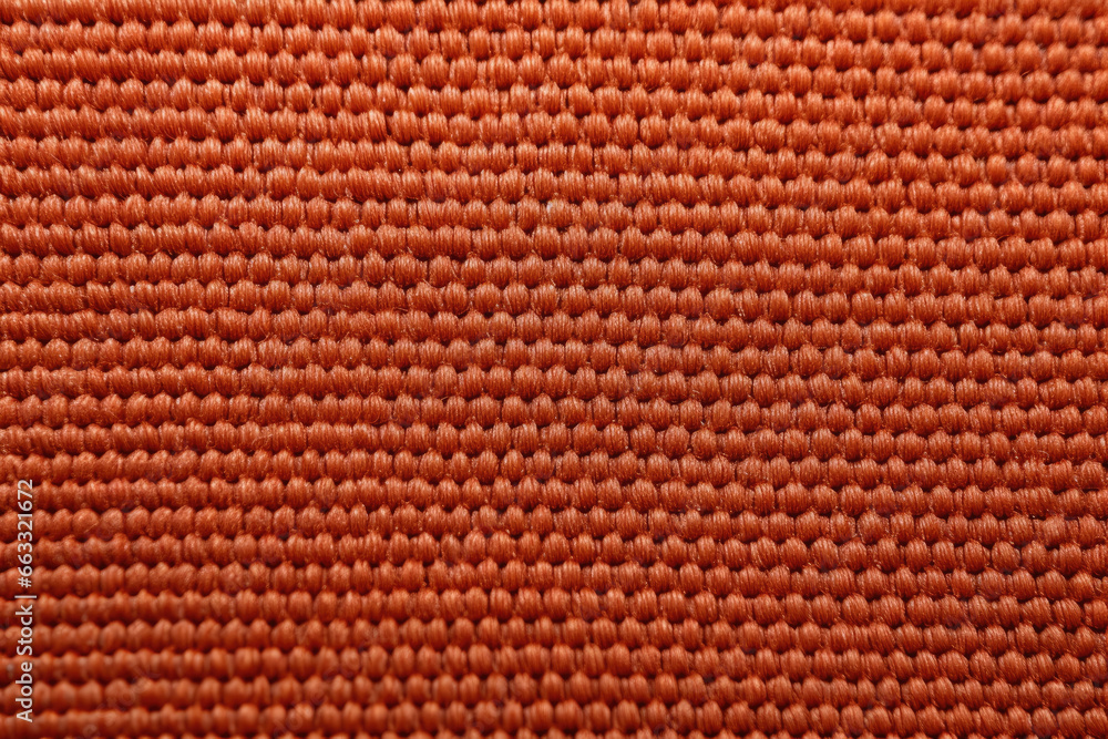 Fototapeta premium Polyester's Exquisite Details: A Captivating Closeup Unveiling Intricate Textures and Vibrant Hues of this Versatile Synthetic Material in Fashion and Textile Industry.