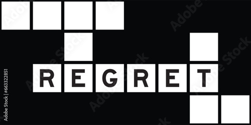 Alphabet letter in word regret on crossword puzzle background