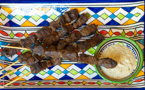 Moroccan Beef Kebab on Skewers, Traditional Arabian Food, Mutton Shashlik, Skewered Grilled Veal Meat photo