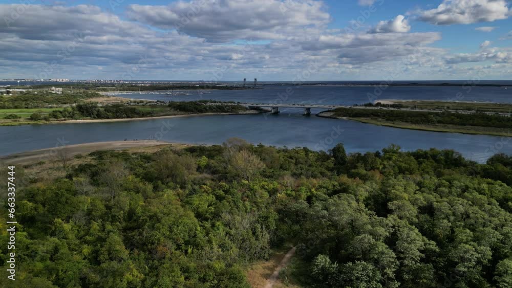 custom made wallpaper toronto digitalaerial footage of cars driving on a highway bridge overpass above creek (brooklyn queens expressway, BQE) with gil hodges bridge and jamaica bay in the background (nyc, new york city) drone shot
