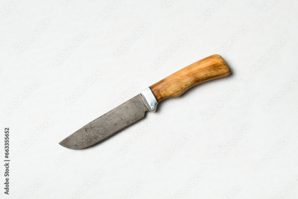 Handmade knife isolated over white background Handmade knife isolated over white background