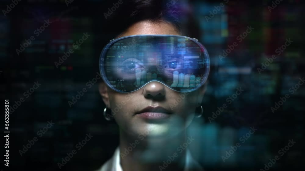 Dolly In of Young Female Financial Broker Working with VR Glasses. Augmented Reality Headsets with Economy Elements appearing. Charts, Graphs and Stock Exchange Data.
Dolly In of Young Female Financial Broker Working with VR Glasses. Augmented Reality Headsets with Economy Elements appearing. Charts, Graphs and Stock Exchange Data.
