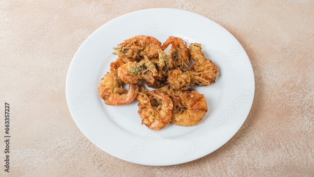 Crispy Shrimp on a white plate. Top angle. Crispy Shrimp on a white plate. Top angle.