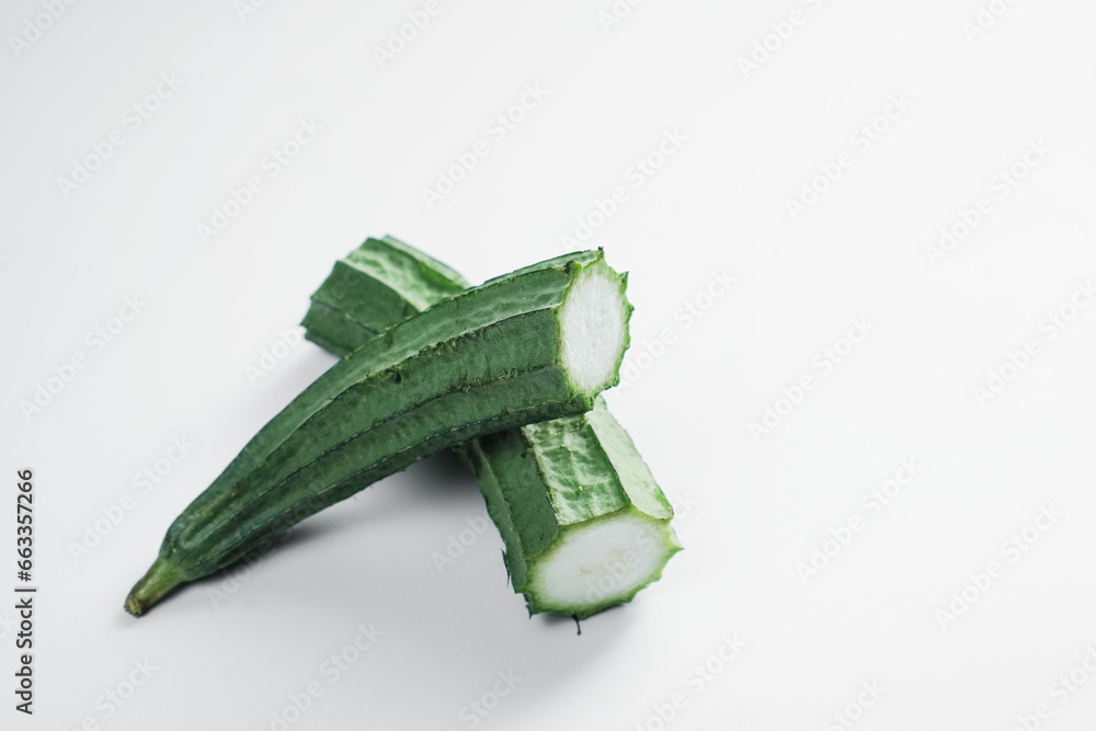 Pieces of Gambas or raw Gourd, Luffa Acutangula Isolated on white background. Pieces of Gambas or raw Gourd, Luffa Acutangula Isolated on white background.