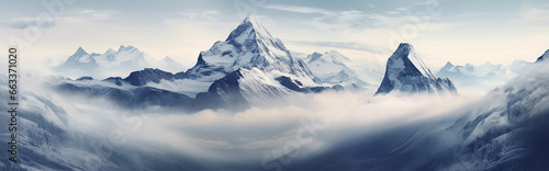 panorama landscape of mountains snowy peaks of rocks in fog and clouds. © kichigin19