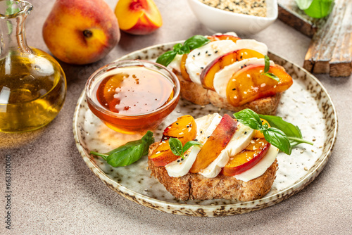 Breakfast sandwiches bread toast, bruschetta with grilled peaches and cheese. Healthy appetizer or snack. Food recipe background. Close up