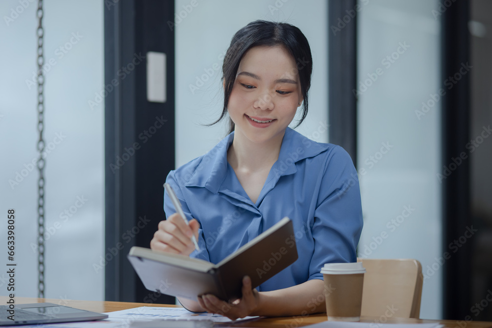 Happy young woman sitting at desk, Woman student online with laptop, Distant education concept. Happy young woman sitting at desk, Woman student online with laptop, Distant education concept.