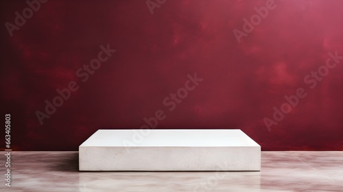 Square Stone Podium in front of a burgundy Studio Background. White Pedestal for Product Presentation