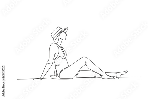 A woman sunbathing on the beach. Staycation one-line drawing