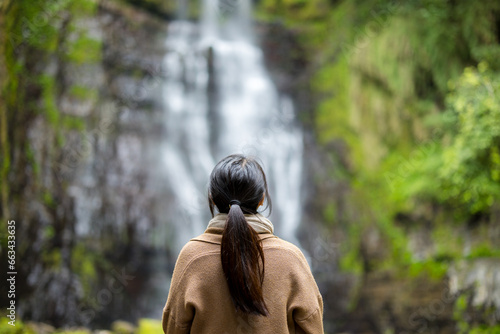 Woman look at the Wufengqi waterfall in Yilan of Taiwan