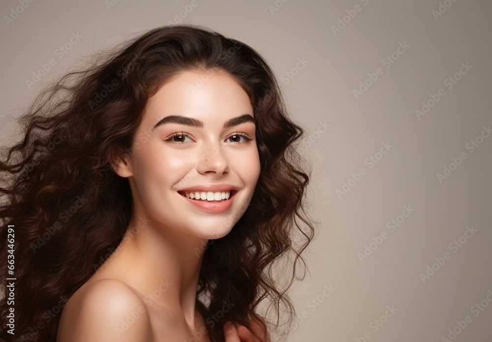 Portrait of a young woman with beautiful skin, on pink plain background. Beauty and cosmetics concept. Portrait of a young woman with beautiful skin, on pink plain background. Beauty and cosmetics concept.