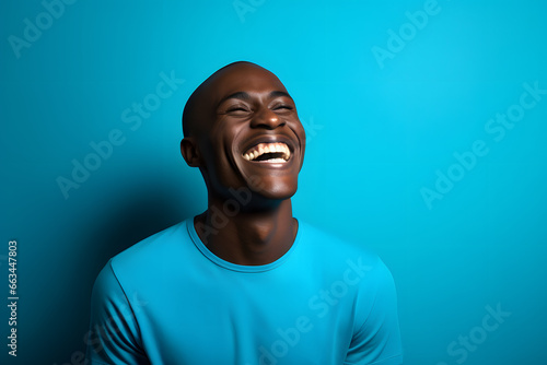 Colorful studio portrait of an ethnic man smiling happily. Pale blue dominant color. Generative AI