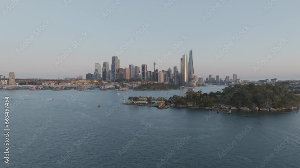 Aerial view of skyscrapers from a financial district in Sydney downtown along Parramatta River and the bay, New South Wales, Sydney, Australia. Aerial view of skyscrapers from a financial district in Sydney downtown along Parramatta River and the bay, New South Wales, Sydney, Australia.