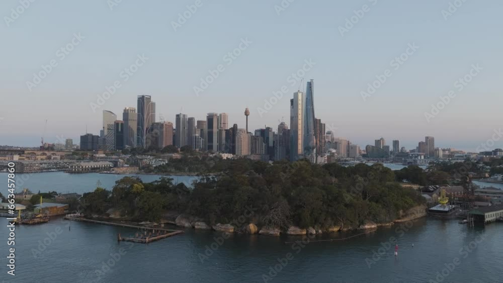 Aerial view of skyscrapers from a financial district in Sydney downtown along Parramatta River and the bay, New South Wales, Sydney, Australia. Aerial view of skyscrapers from a financial district in Sydney downtown along Parramatta River and the bay, New South Wales, Sydney, Australia.