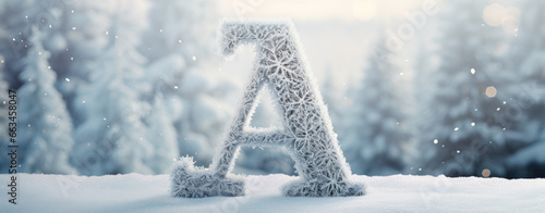 capital letter A christmas card with christmas decoration, white snow background, logo