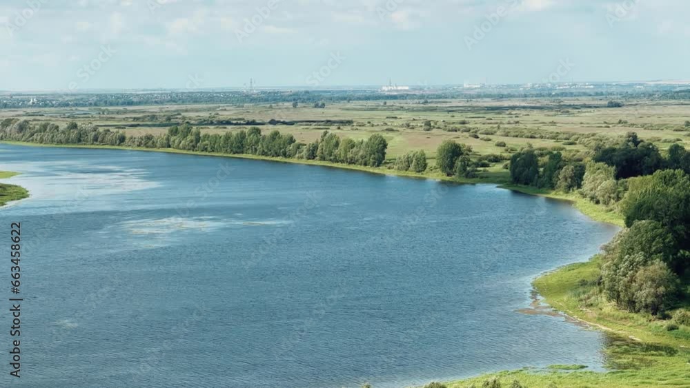 Picturesque view of the Kama River from the observation deck at the Yelabuga settlement. The movement of clouds over the river. Lower Kama National Park. Yelabuga, Republic of Tatarstan, Russia, 4K Picturesque view of the Kama River from the observation deck at the Yelabuga settlement. The movement of clouds over the river. Lower Kama National Park. Yelabuga, Republic of Tatarstan, Russia, 4K